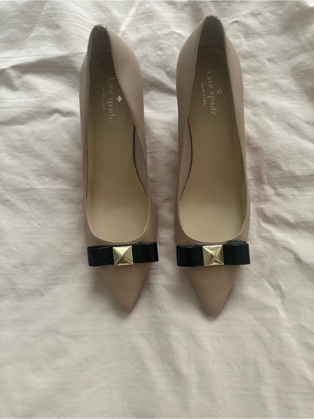 kate spade Nude Pointed Toe Flats with Black Bow and Gold Accent